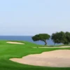 Tazegzout Golf Course in Taghazout Bay featuring lush fairways, Argan trees, and panoramic Atlantic Ocean views.